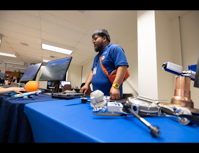 JR Ancheta brought a drone petting zoo and a couple flight simulators from ACUASI, the drone research unit at the Geophysical Institute. Photo by Bryan Whitten