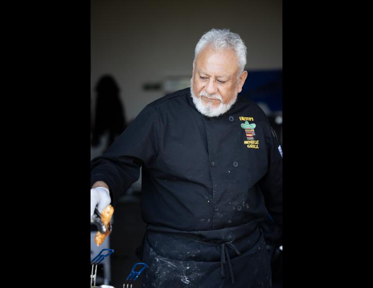 Ernesto himself of Ernesto's Mexican Cuisine in Glenallen tending the halibut fryer. Photo by Bryan Whitten
