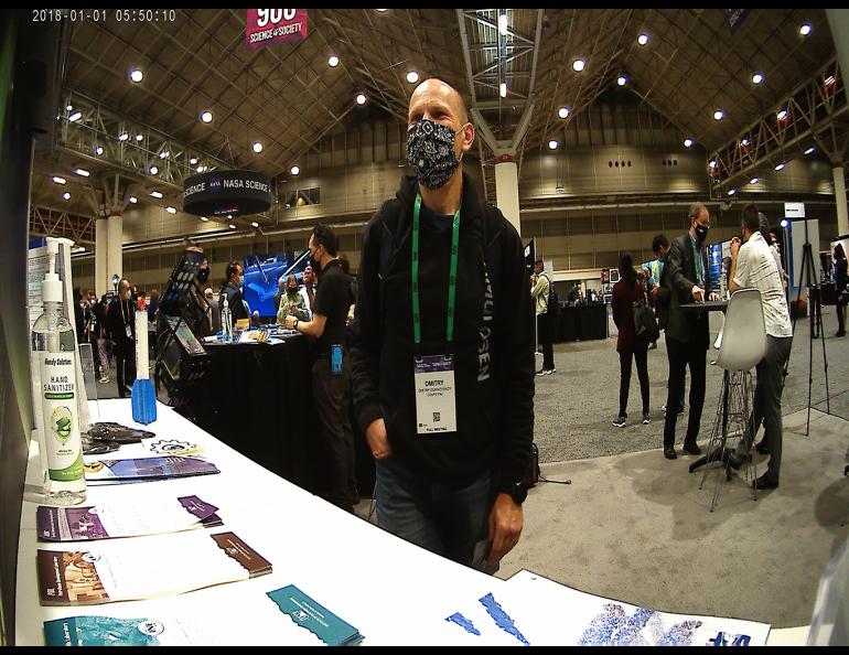 Brian Lu set up a GoPro to take time lapse photos of visitors to the booth. Photo by Brian Lu