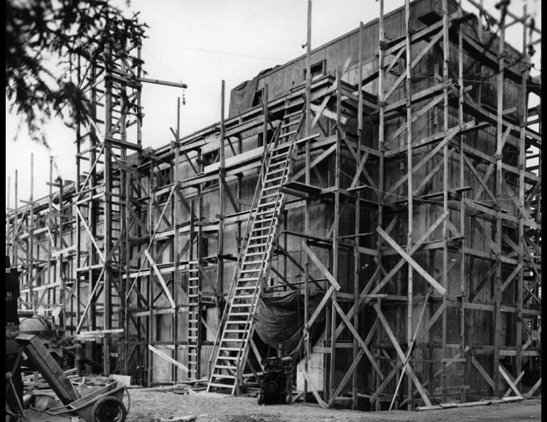The first home of the Geophysical Institute under construction on lower campus. When the building was completed in 1950, it was considered the finest research facility of its kind in the United States. In 1968 it was renamed the Chapman Building. GI photo.