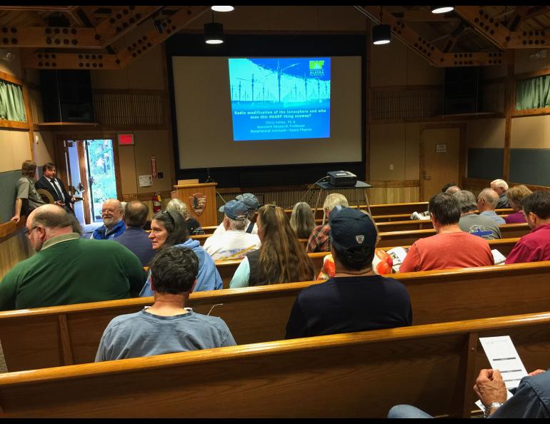 Chris Fallen (closest to door) preparing to make a presentation at the Wrangell-St. Elias National Park Visitor Center in Copper Center, Alaska as part of the first HAARP Open House Aug. 26, 2016. Photo courtesy Jessica Matthews 