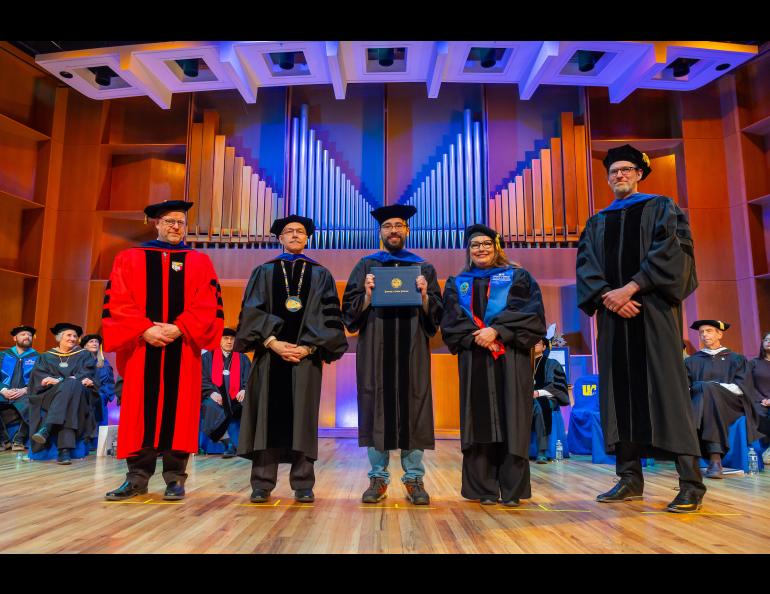 Mario Angarita Vargas with Chancellor Sfraga and Interim Provost Charlene Sterm while CNSM Dean Karsten Huffer and Ronni Grapenthin look on. Photo by Eric Engman
