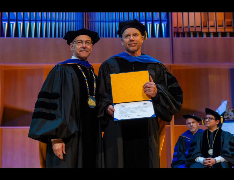 Chancellor Mike Sfraga and Science Writer Emeritus Ned Rozell. Photo by Eric Engman