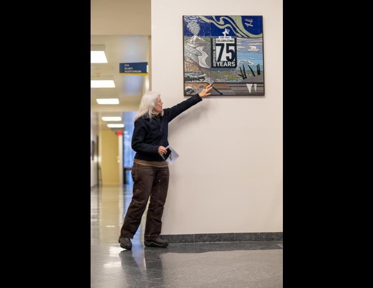 Nancy Hausle-Johnson explained all the aspects of the GI represented in the tile mural she created. Photo by Daniel Walker