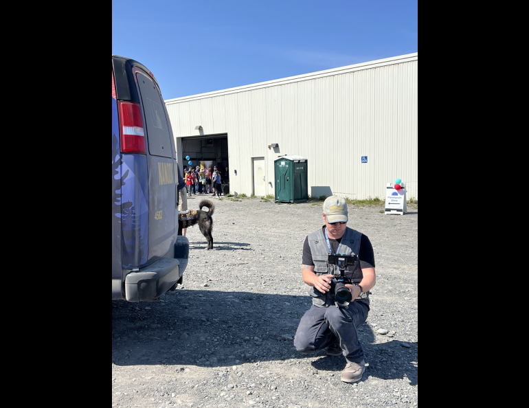 GI Design Services photographer Bryan Whitten getting a low-angle shot. Photo by Kelly Eagan