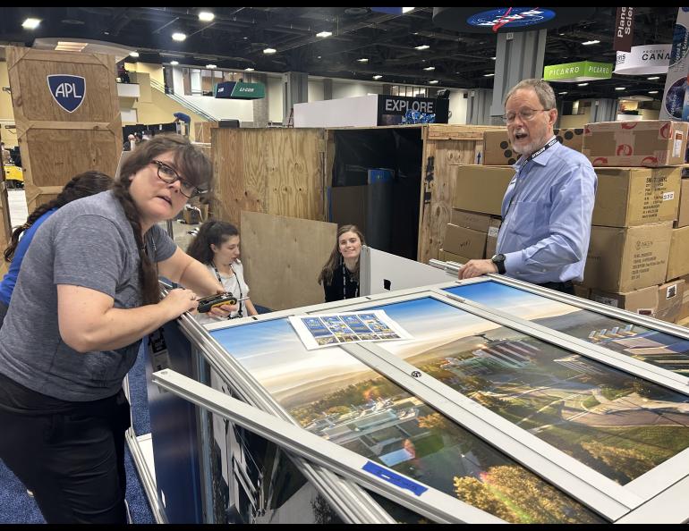 Assembling the tower on the exhibit hall floor. Photo by Rod Boyce