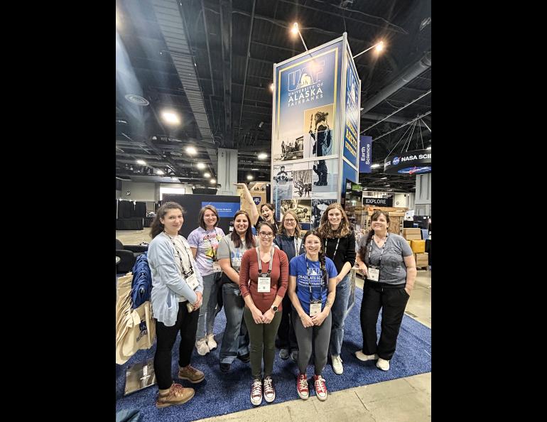 The booth install team included (L to R) Chynna Lockett, IARC; Nicole Houseweart, ASF; Jessica Ramos, ASF; Samantha Wiser, AEC; Kate Avery, INE; Doreen Hayward, GI; Gracie Banister, CNSM; Kelly Eagan, GI; Becky Lindsey, GI. Photo by Rod Boyce