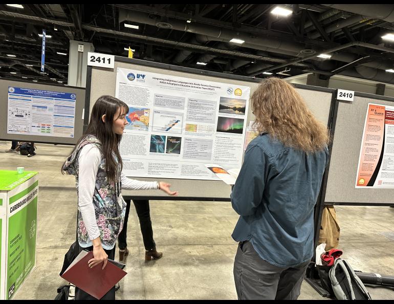 Grace Angivran Moore-Anderson, graduate student and staff in the GI Education Outreach unit, presents her poster at AGU24 in Washington, D.C. Photo by Lori Schoening