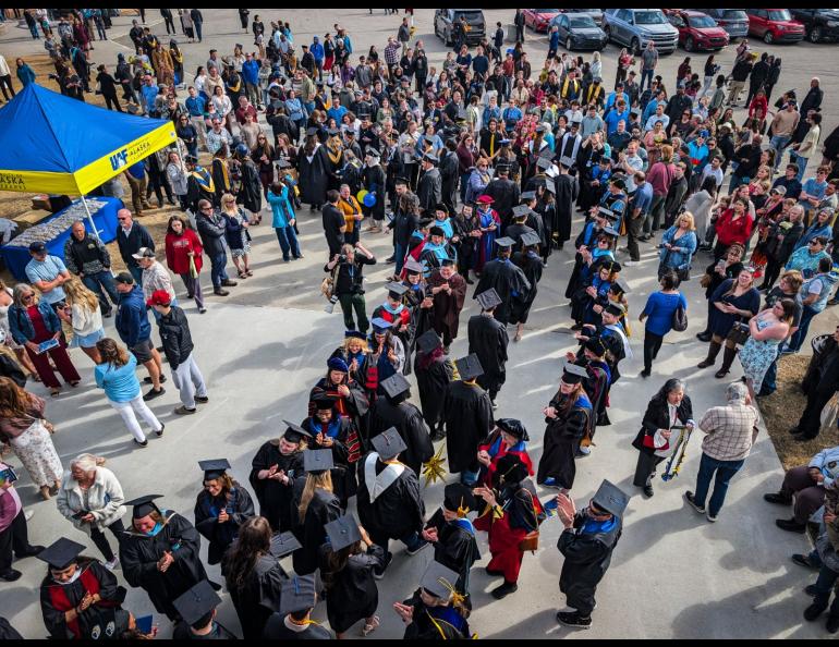 For many years the tradition at UAF's commencement ceremonies is for the faculty to line up on either side to applaud as all of the graduates depart the venue. Photo by JR Ancheta 