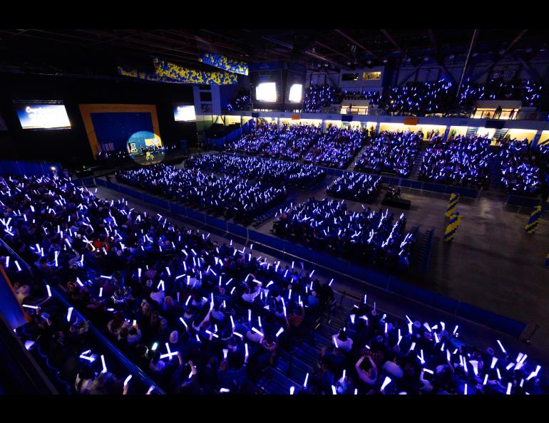 Light sticks during the 2025 University of Alaska Fairbanks Commencement Ceremony Saturday, May 3, 2025 at the Carlson Center. UAF photo by Eric Engman