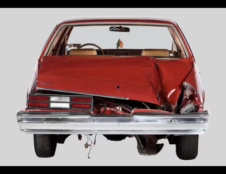 The Chevrolet Malibu whose right rear fender was smashed by the Peekskill meteorite in 1992. Photo courtesy Peekskill Meteorite Car website.