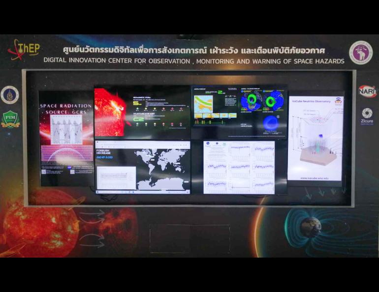The Space Weather Monitoring War Room at Chiang Mai University, Thailand, with a combination of data sources including neutron detections corresponding to the incoming cosmic rays, the IceCube project for detecting neutrinos, and the Geophysical Institute aurora forecast for auroral analysis. Photo courtesy Chiang Mai University