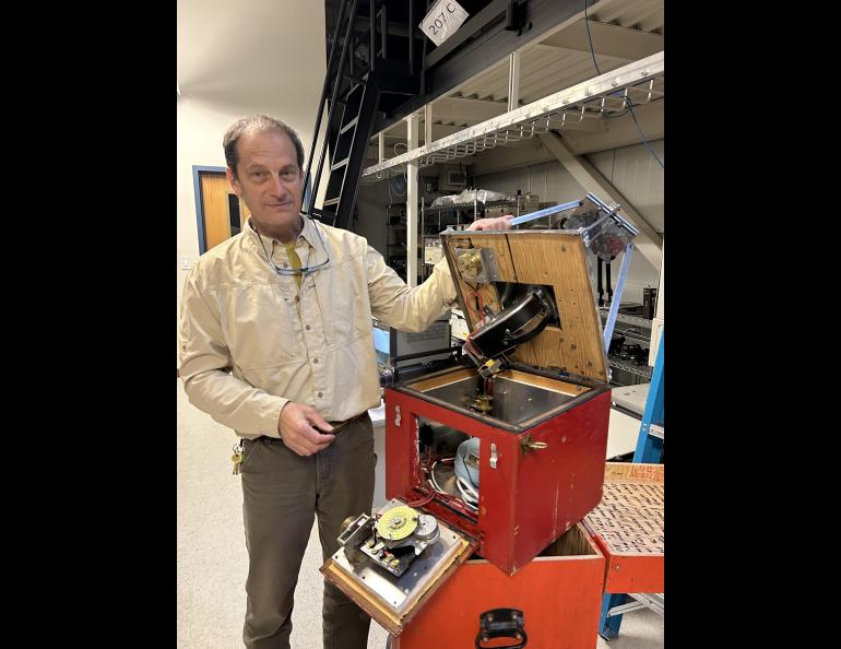 Don Hampton Don Hampton gives a demonstration of one of the original all-sky cameras that were used for aurora research during the Poker Potluck Pig Roast on Aug. 23, 2024. Photo by