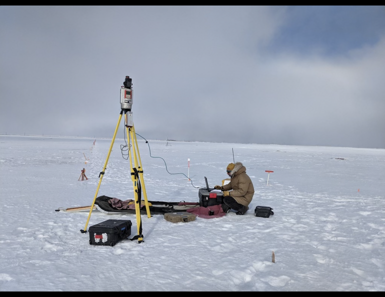 Phillip Wilson on the Terrestrial Lidar Scanner, still wearing a parka in June. Photo courtesy Serina Weser