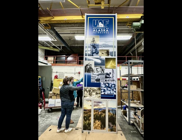 Setting up the tower in the Elvey garage. Photo by Vicki Daniels