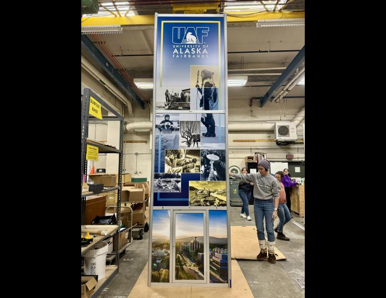 Setting up the tower in the Elvey garage. Photo by Vicki Daniels