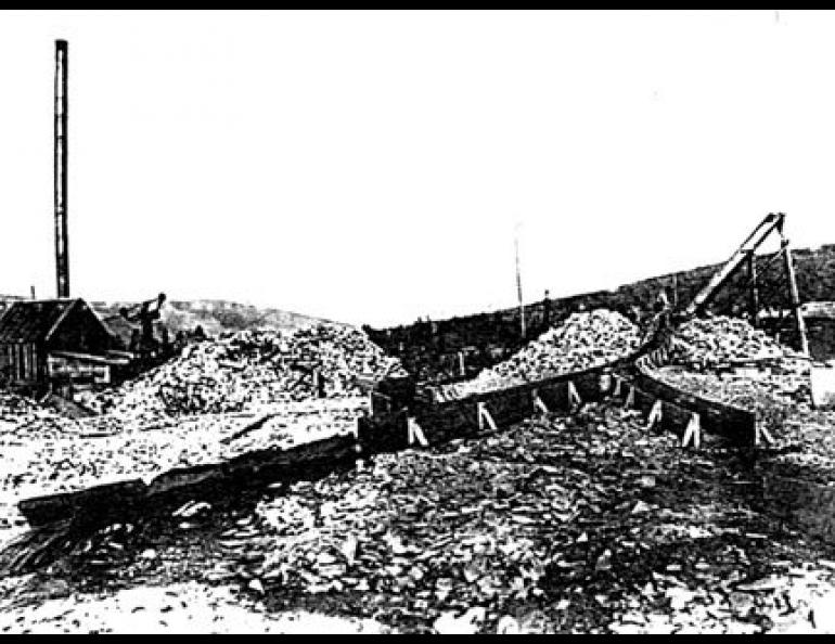 Photograph from the Selid-Bassoc collection in the archives of the University of Alaska, Fairbanks, showing a Y-shaped sluicebox.