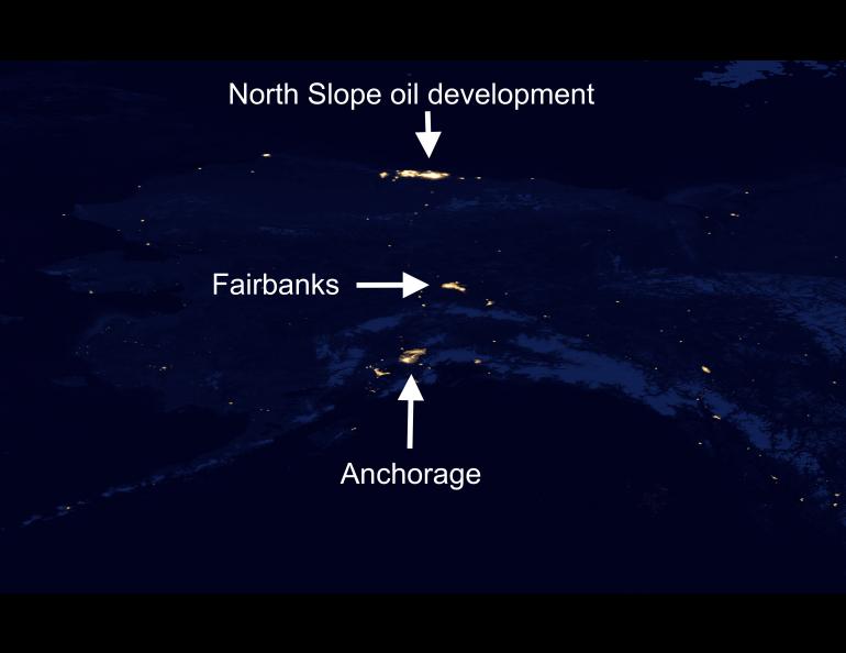 Alaska at night, showing a good deal of blackness that represents undisturbed habitat for many non-human creatures. NASA Earth Observatory, public domain image.