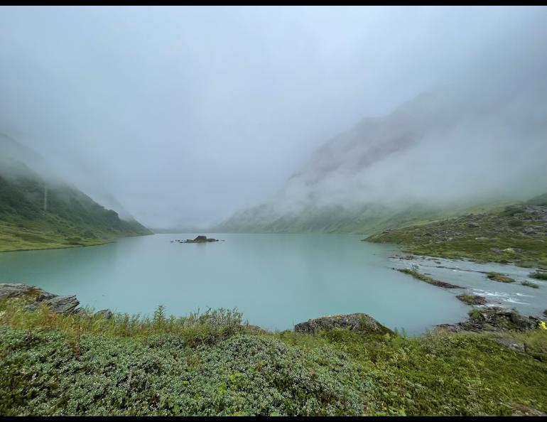 A steady rain falls on Allison Lake, a basin perched above Valdez in the Chugach Mountains. Photo by Ned Rozell.