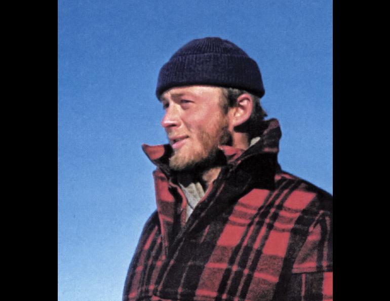 Carl Benson pauses during one of his traverses of Greenland in 1953, when he was 25. Photo courtesy of the UAF Geophysical Institute.