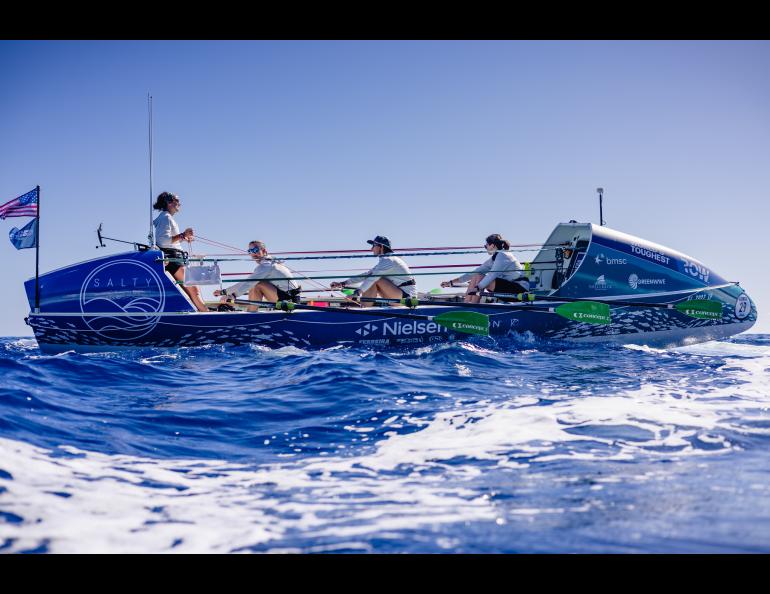 From left, Lauren Shea, Chantale Bégin, Isabelle Côté and Noelle Helder propel their 28-foot boat Emma off the coast of Florida during a training run for their crossing of the Atlantic Ocean. Photo courtesy Noelle Helder.