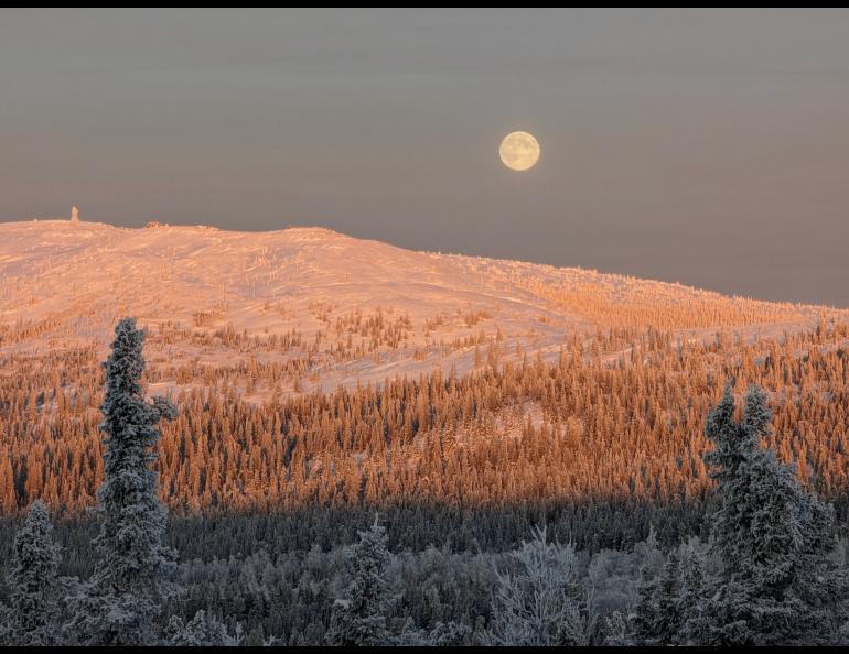 John Eichelberger of Fairbanks took this photo of the full moon on Dec. 26, 2023, north of Fairbanks. At the time he took this photo — solar noon in Fairbanks or about 1 p.m. local time — the full moon appeared due north of him. Photo by John Eichelberger.