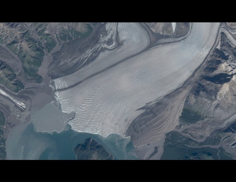 A recent “embayment” bite out of the face of Hubbard Glacier, which may indicate the presence of a subglacial river. Image courtesy Mark Fahnestock. 