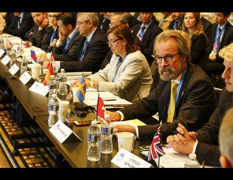 Konrad Steffen, wearing glasses and a yellow tie, at the White House in 2016, where he represented Switzerland at the first Arctic Ministerial Conference. Photo courtesy Swiss Federal Institute for Forest, Snow and Landscape.