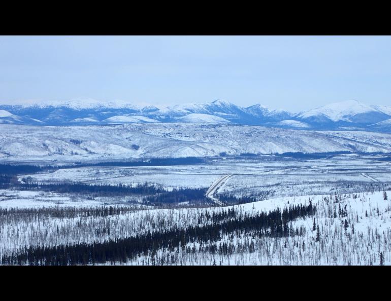 The Dalton Highway winds through the Jim River and Prospect Creek valleys in northern Alaska, where an official thermometer registered Alaska’s all-time low of minus 80 degrees F on Jan. 23, 1971. Photo by Ned Rozell.