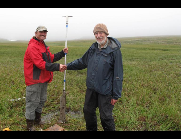 Rich Kleinleder and David Klein on St. Matthew Island in August, 2012, after they pulled a core of sediment from the island. Ned Rozell photo.