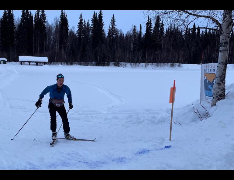 Shalane Frost skis the last few feet of a 55-mile course to win the ski division of the Chena River to Ridge Race east of Fairbanks on March 5, 2022. Corrine Leistikow photo.
