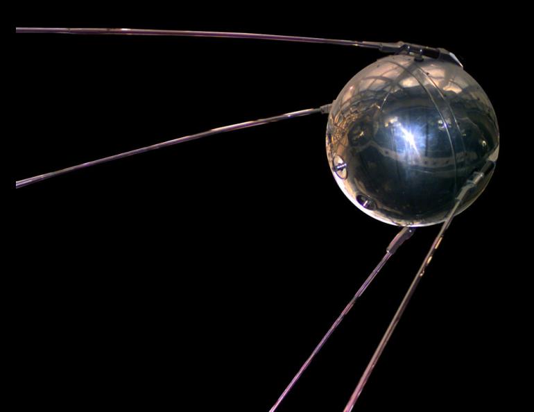 A replica of the first manmade satellite, Sputnik 1, launched by the Russians in 1957 at the start of the Space Age. This replica is in the National Air and Space Museum. NASA public domain photo.