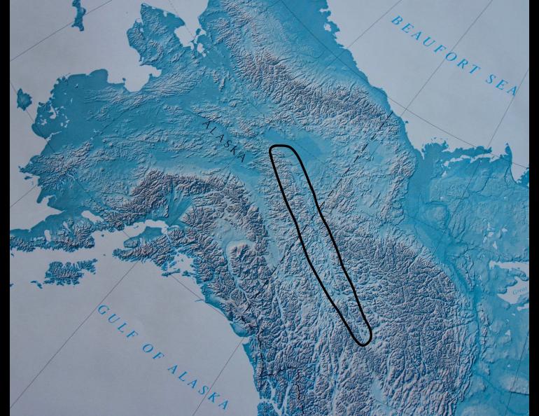 The Tintina Trench, a straight line between mountains, reveals the Tintina Fault. The Tintina Trench combines with the Rocky Mountain Trench to extend all the way to Montana. Ned Rozell image.