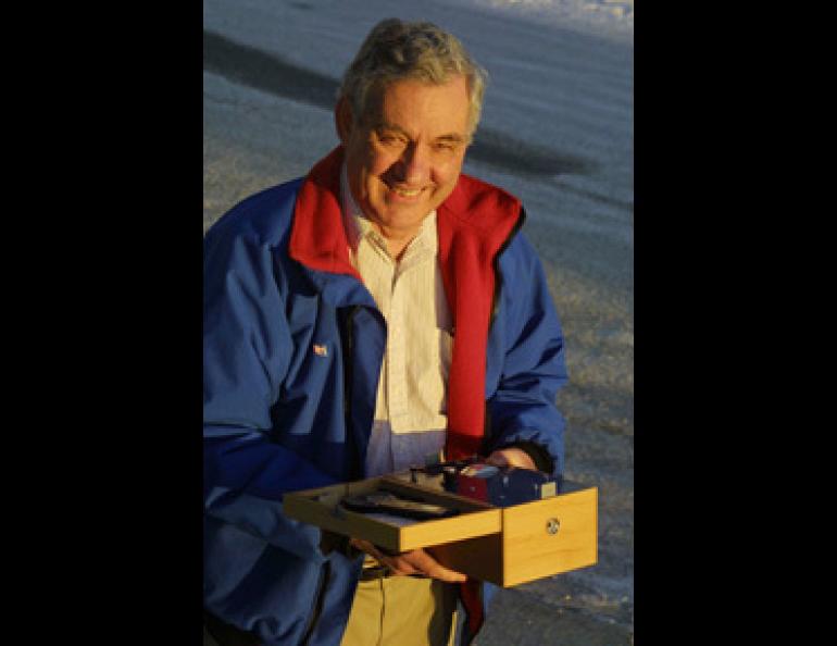Glenn Shaw and his little wooden box, a sun photometer.