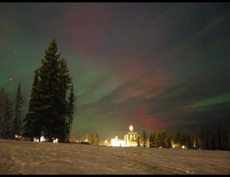  Todd Parris, a graduate student at the University of Alaska Fairbanks, took this photo of solar-flare induced red aurora over the Geophysical Institute on the UAF campus the evening of Oct. 28, 2003 at about 10:15 p.m. Todd Parris photo. 