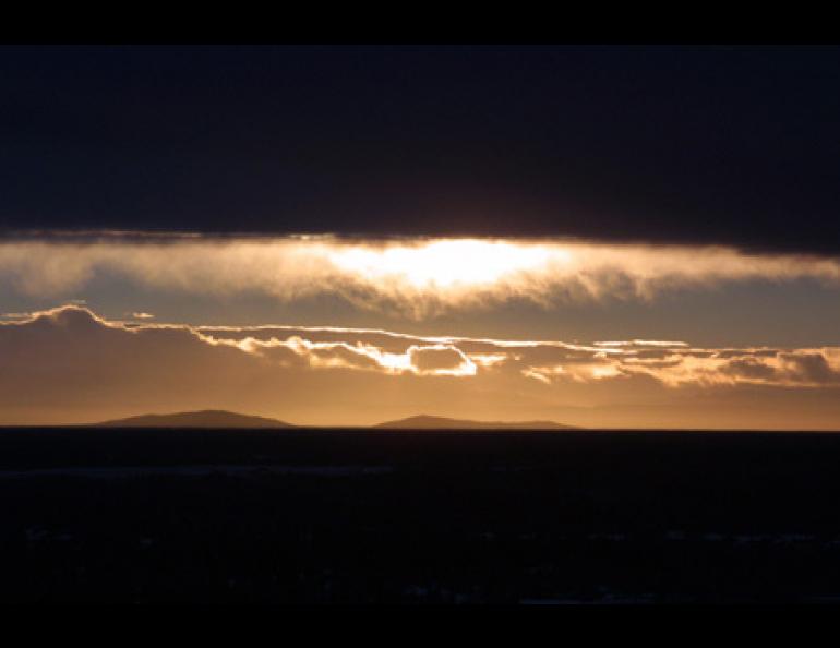  The interior Alaska sky during a chinook, a phenomenon that occurs when air from south of the Alaska Range warms rapidly on its descent of the north side of the mountains. Photo by Ned Rozell. 