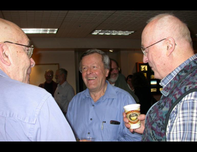  Photo by Ned Rozell: Gunter Weller, retiring after more than 35 years of observing climate change in Alaska, talks with colleagues Lew Shapiro and Carl Benson during a recent gathering in UAF’s Geophysical Institute. 