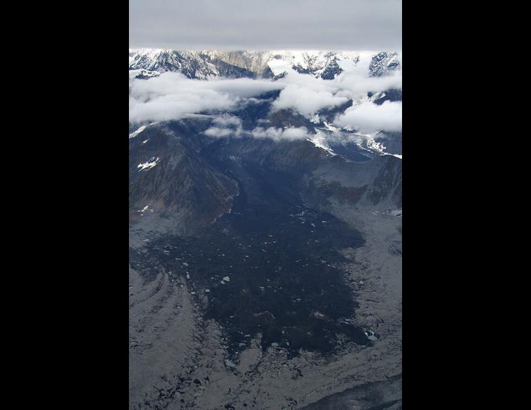 A view of an enormous rock delta from the avalanche of Mt. Steller that registered on seismometers all over Alaska. The amount of rock and ice that fell was equal to a pile one mile long, one-third mile wide, and 50 yards high. Ruedi Homberger photo, courtesy of Ultima Thule Lodge.