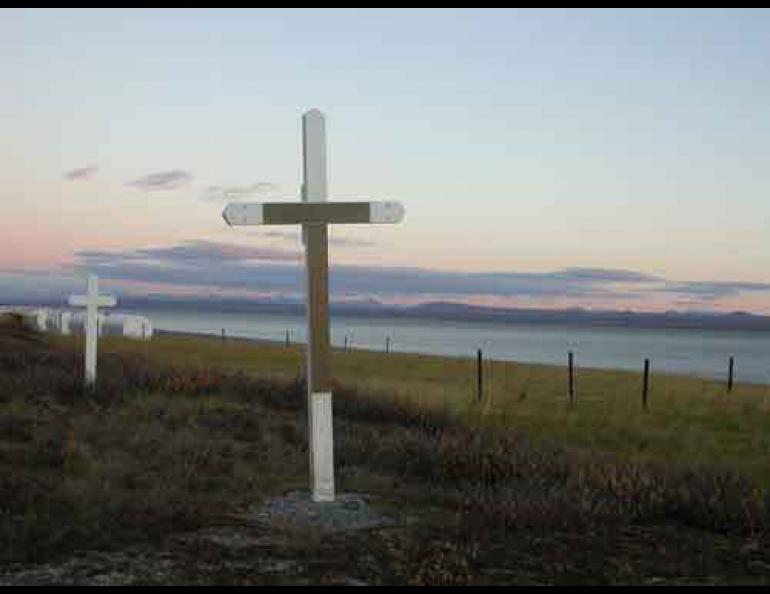A cross marking the mass grave at Brevig Mission. Johan Hultin, who visited Brevig Mission in 1951 and 1997 to retrieve samples of the 1918 flu, built the cross to replace one that had fallen. Ned Rozell photo.