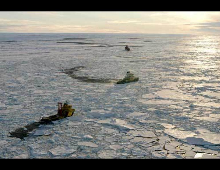 Two icebreakers and a drilling ship near the North Pole in late summer 2004. Scientists drilled into a massive underwater ridge and retrieved a core loaded with information about the ancient Arctic Ocean, including evidence that it once was about as warm as the ocean off Florida. Photo by Martin Jakobsson, Stockholm University.