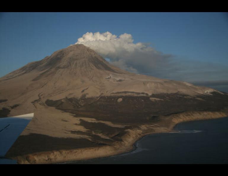 John Eichelberger of the Alaska Volcano Observatory took this photo of Augustine on Jan. 18, 2006. Taken from the southwest, the photo shows new pyroclastic flows and that the snow that was on the mountain has disappeared. John Eichelberger photo.