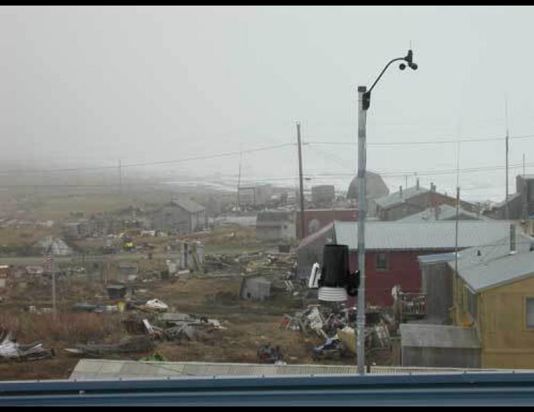  The view from the roof of the Shishmaref School, where a Davis weather station is installed as part of the Arctic Climate Modeling Program. Photo by Ned Rozell. 