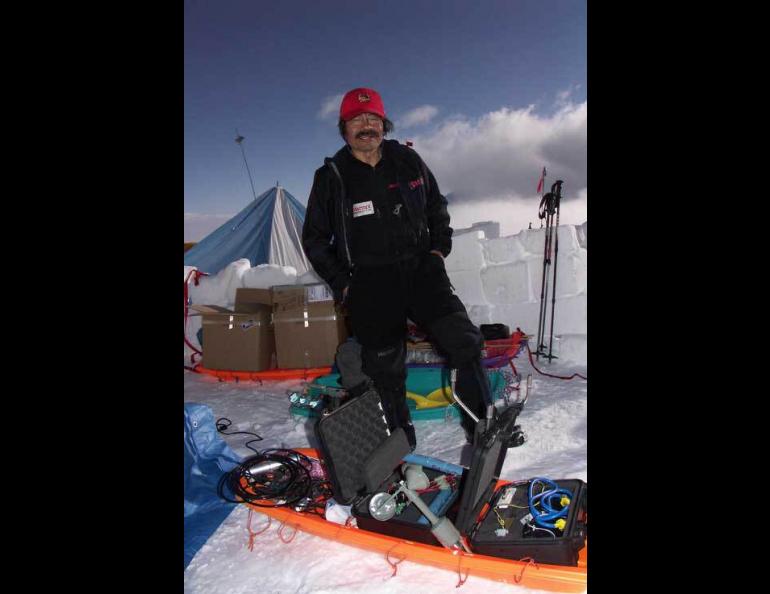  Yoshitomi Okura on Denali with components for a weather station at 18,733 feet on the mountain. Photo by Tohru Saito. 