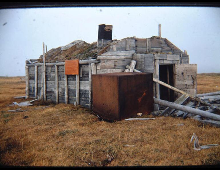  The main building at Leffingwell’s living site on Flaxman Island in a 1970 photo. Stacey Fritz of Fairbanks, visited Flaxman Island on a boating trip along the Arctic coast in the summer of 2008, described the present cabin as “a large pile of sod and lumber.” Photo by Gil Mull. 