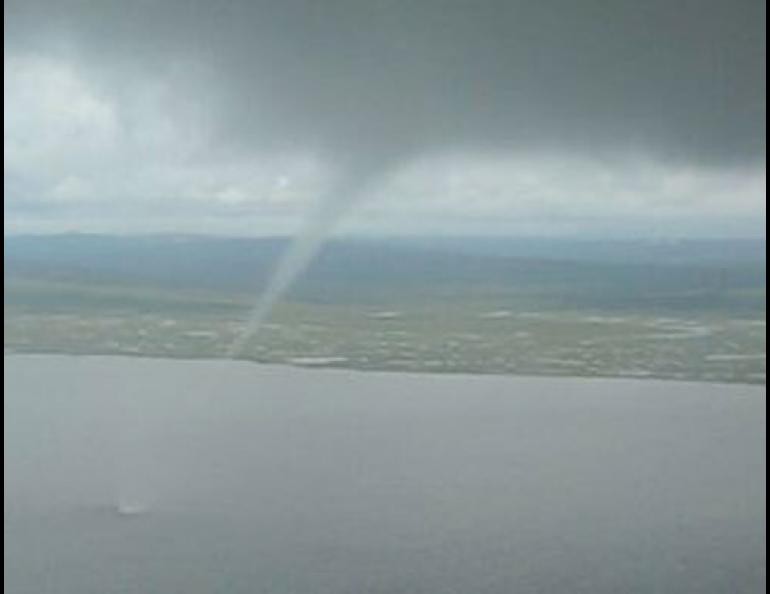  A single frame from Dorothy Ivanoff’s video of a waterspout she saw near Koyuk in August. Photo courtesy Dorothy Ivanoff. 