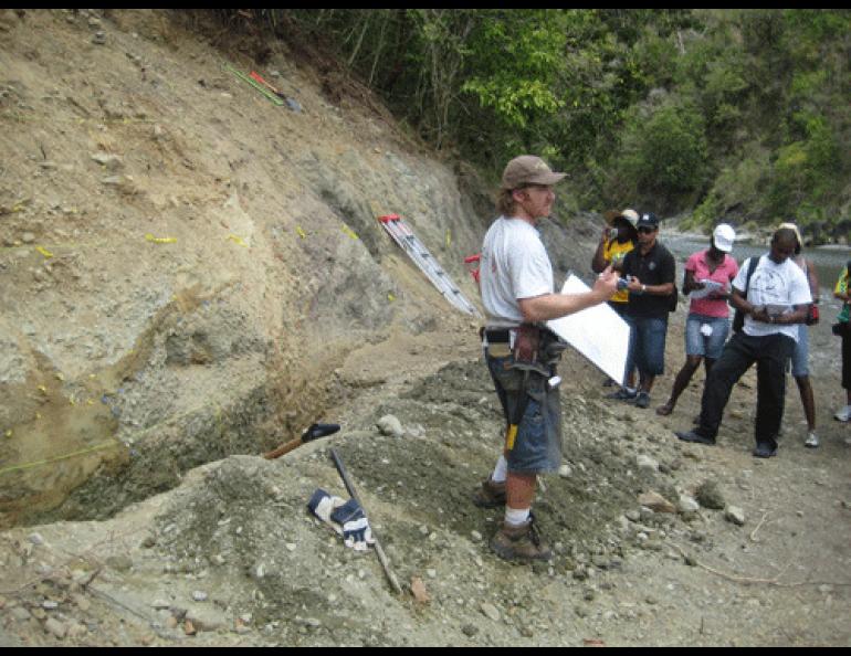  Rich Koehler of the Alaska Division of Geological and Geophysical Surveys lectures to students in Jamaica in March 2009 along a surface expression of the Plaintain Garden fault system, part of the boundary between Earth’s plates that slipped, causing the 2010 Haiti earthquake. Photo by Paul Mann. 