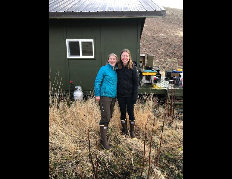 Biologists Briana Bode, left, and Katie Stoner as they were dropped off at their cabin on Chowiet Island in May 2021. The women recently experienced a magnitude 8.2 earthquake there, not far from the epicenter. Photo by Heather Renner, Alaska Maritime National Wildlife Refuge.