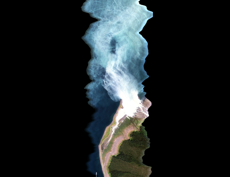 Aerial photo of glacial melt flowing into bay