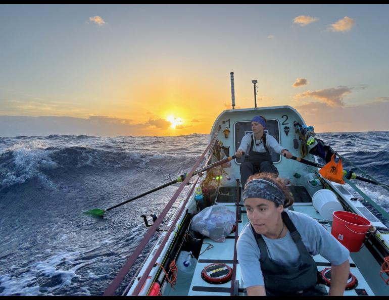 Lauren Shea, foreground, and Noelle Helder row into the sunset as they cross the Atlantic Ocean as part of a four-woman team. Photo courtesy Noelle Helder.