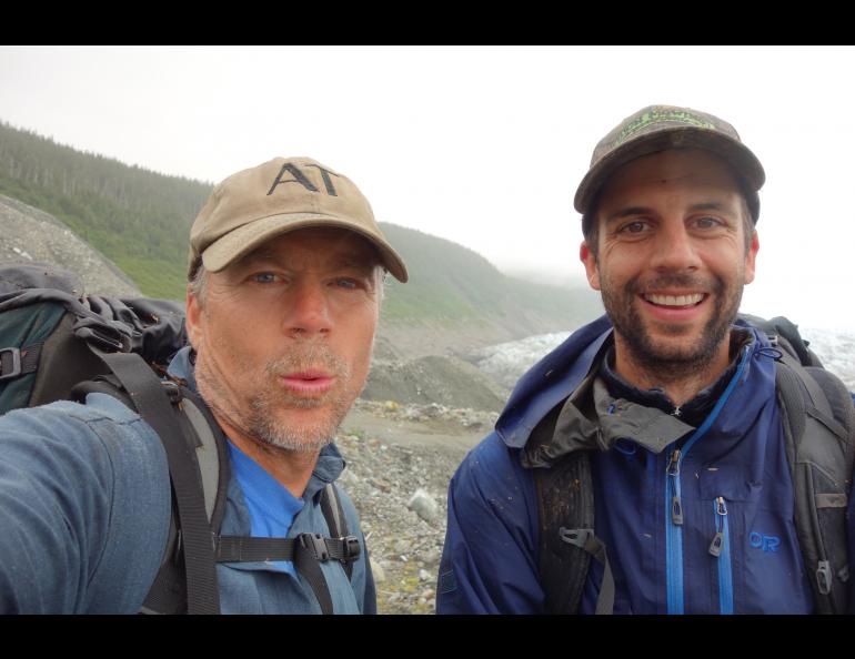 Science writer Ned Rozell, left, and UAF ecologist Ben Gaglioti pause after a slippery, seven-hour rainforest hike near La Perouse Glacier on July 3, 2021. Photo by Ned Rozell.